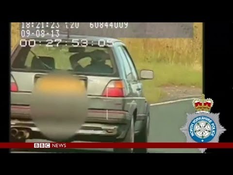 DRIVER FILMED WITH HANDS BEHIND HEAD AT 100 KM/H – BBC NEWS