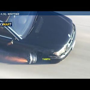 CHASE: BMW tire blows out the full design down to rim, throws sparks on freeway