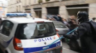 Protesters torch police vehicle at some stage in Paris demonstrations