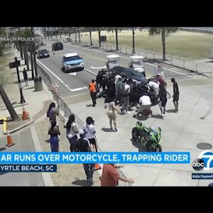 Video: Onlookers, police bustle to rescue motorcyclist trapped below automobile in Myrtle Sea straggle l ABC7