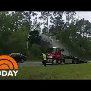 Car flies 120 toes after riding up tow truck ramp at fat tempo