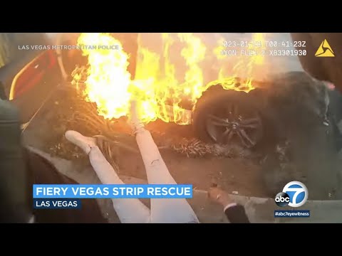 Unique bodycam video shows driver rescued from flaming automobile after wreck
