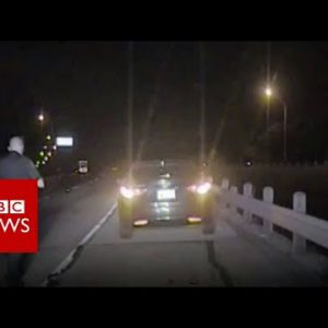 Drunk driver crashing into police officer – BBC News