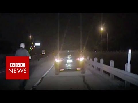 Drunk driver crashing into police officer – BBC News