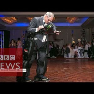 Paralysed father ‘walks’ at daughter’s wedding in a ‘robo-swimsuit’ – BBC News