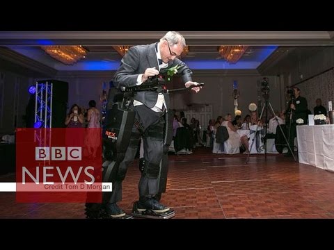 Paralysed father ‘walks’ at daughter’s wedding in a ‘robo-swimsuit’ – BBC News