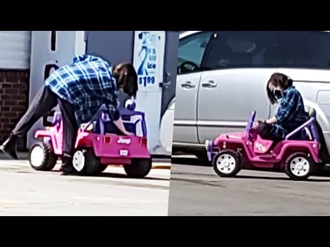 Lady Drives Toy Jeep on Main Roads to the Store