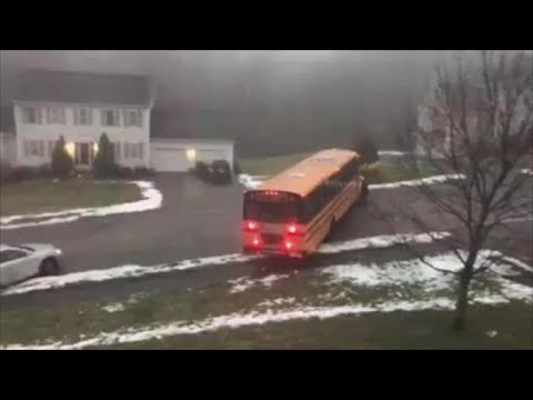 Out-of-reduction watch over college bus slides down frigid avenue, hits vehicle in Massachusetts