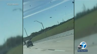 Video reveals debris falling onto dual carriageway after 2 plane wreck mid-air for the interval of Dallas WWII airshow