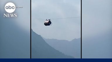 Rescue underway for young individuals dangling from cable car in Pakistan | ABCNL