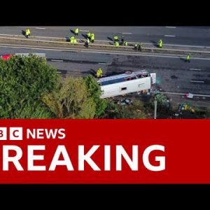 M53 shatter: Teen girl and driver killed after college bus overturns in UK – BBC News