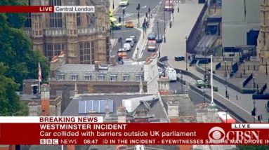 Automobile crashes into gate of U.K. parliament in London