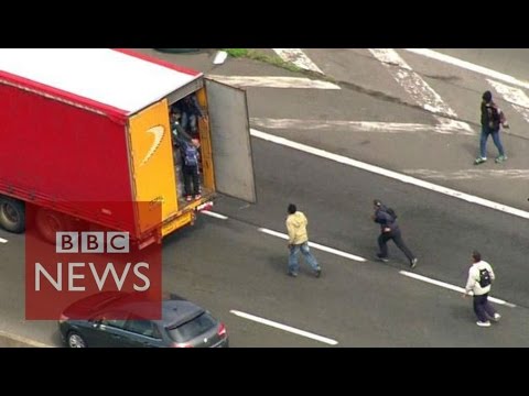 Moment Calais migrants jumped onboard lorries – BBC Files