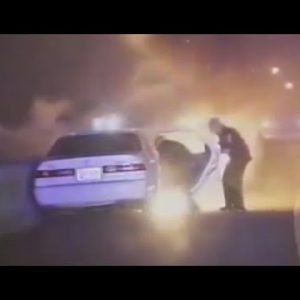 Law enforcement officers Save Man From Burning Car [DASH CAM VIDEO]
