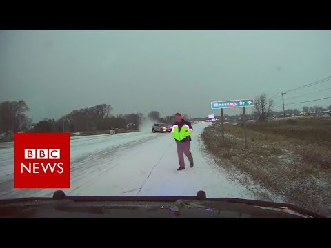 Wisconsin police officer narrowly avoids sliding car – BBC News
