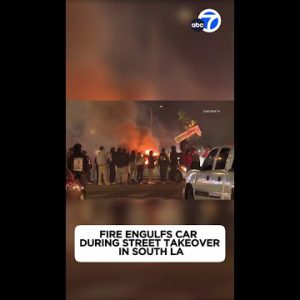 Fire engulfs automobile at some level of avenue takeover at South LA intersection