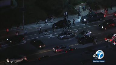 Crowd disperses as LAPD swoops in to interrupt up Granada Hills avenue takeover | ABC7