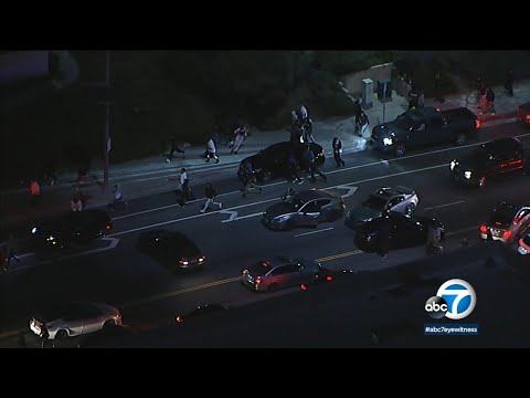 Crowd disperses as LAPD swoops in to interrupt up Granada Hills avenue takeover | ABC7