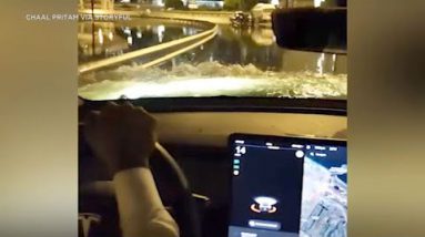 Tesla cuts thru flood waters in Dubai whereas other vehicles got caught