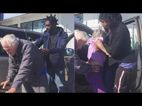 3 Males Encourage Elderly Couple Into Car in Touching Moment