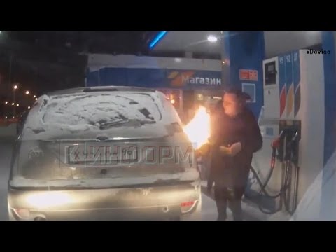 Girl sparks fire searching to unfreeze gasoline pump with lighter