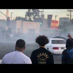 Boulevard takeover: Vehicles inch out approach spectators at Los Angeles intersection | ABC7 Los Angeles