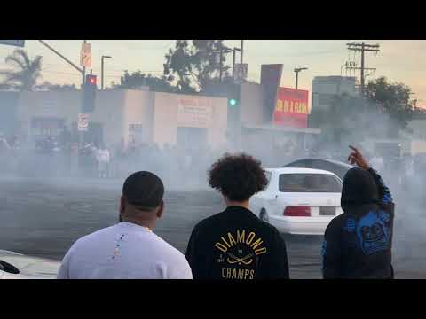 Boulevard takeover: Vehicles inch out approach spectators at Los Angeles intersection | ABC7 Los Angeles