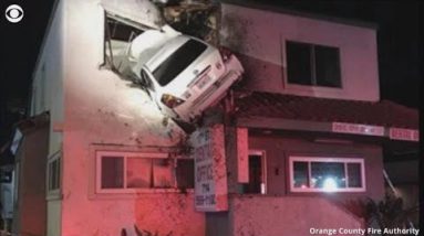 Vehicle goes airborne, flies into constructing